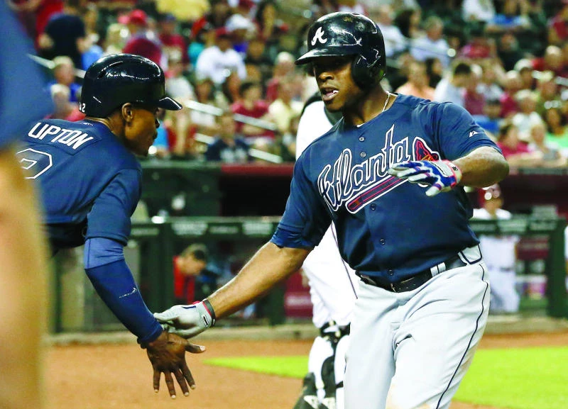 Upton helps Braves rout D’ backs in return to Arizona