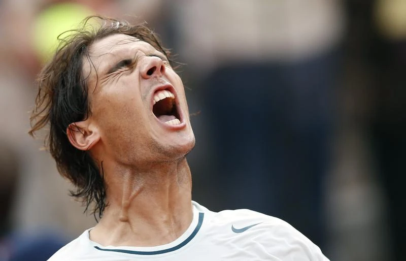 Nadal survives Gulbis test; Djokovic, Serena wins