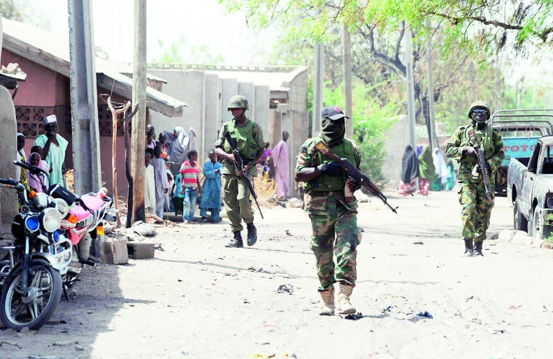 Nigeria military says 10 insurgents killed, 65 arrested