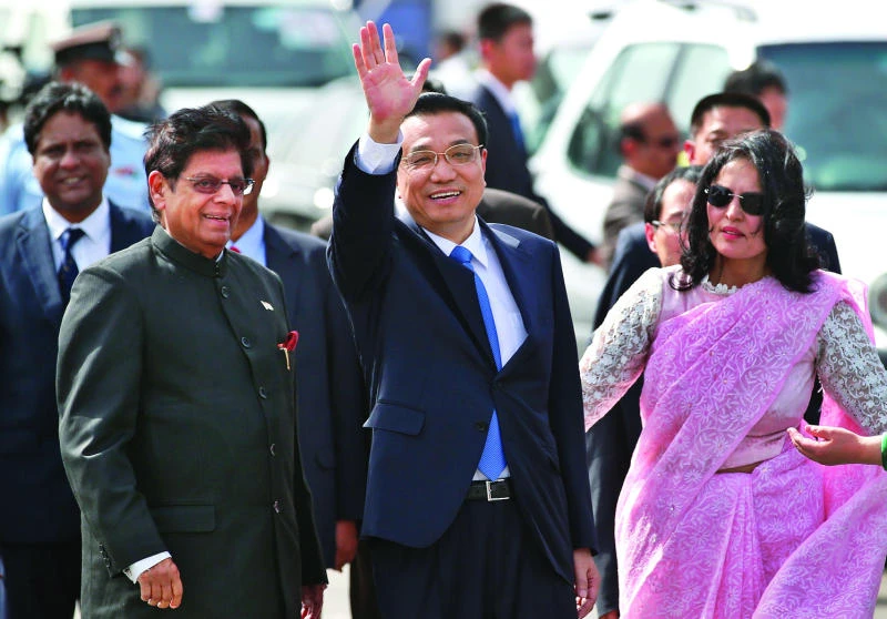 Chinese premier visits India to boost relations
