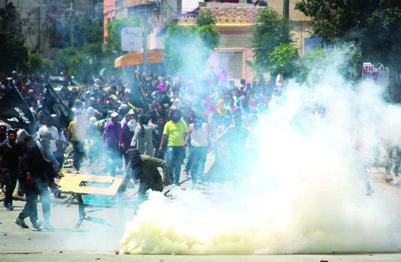 Ansar Al-Shariah supporters clash with police in Tunis