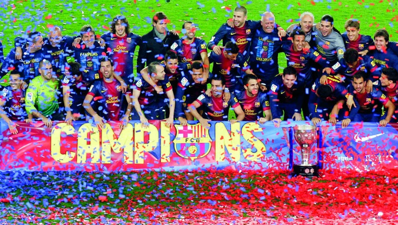 Barcelona toasts title with win over Valladolid