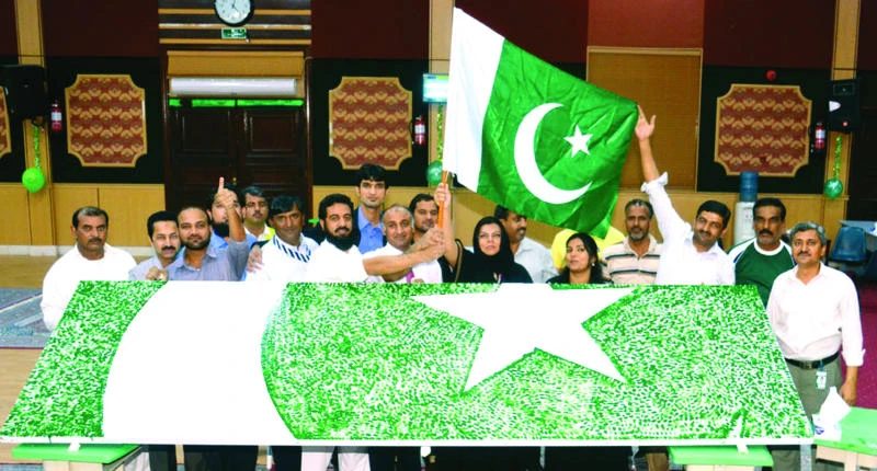 Pakistanis create giant flag from thumbprints