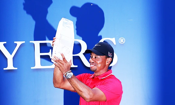 Woods keeps it dry and wins Players Championship