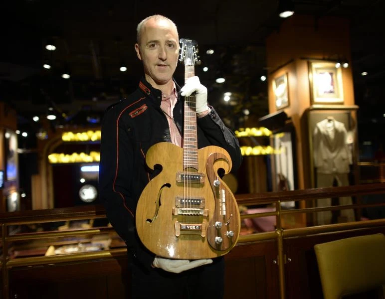 Rare Beatles’ guitar goes to New York auction