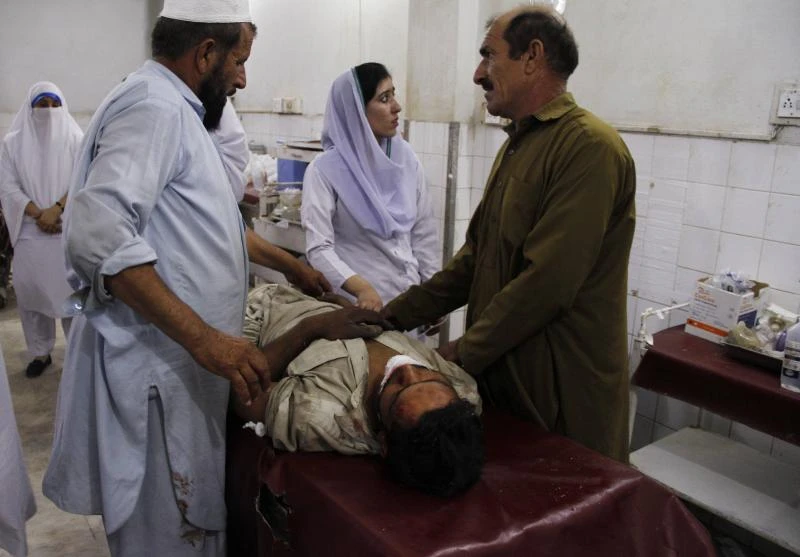 Suicide attack on candidate kills 12 in Pakistan