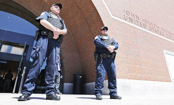 Boston police take three suspects into custody in bomb case