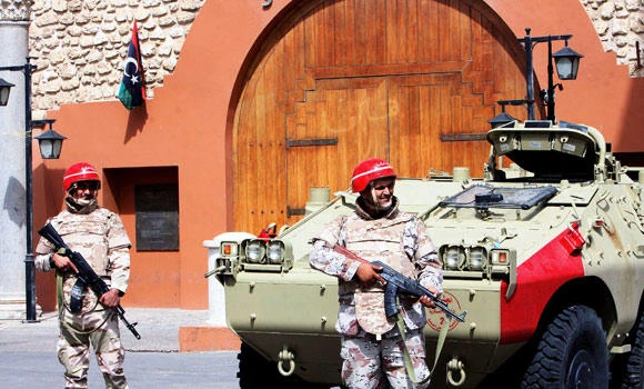 Libyan gunmen besieging ministries demand govt quit