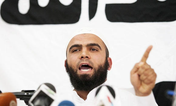 Tunisia ups security as Salafists vow to defy ban