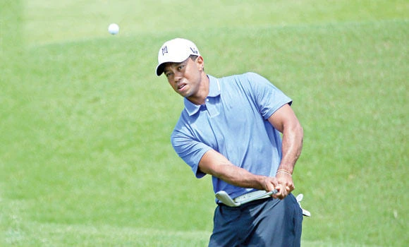 Woods goes from red carpet to TPC Sawgrass