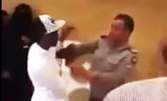 Passport officer arrested for beating up visitor