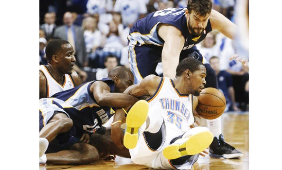 NBA playoffs: Grizzlies strike down Thunder, Heat burn Bulls