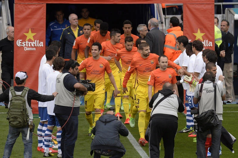 Barcelona, Messi top season-ending AP global poll