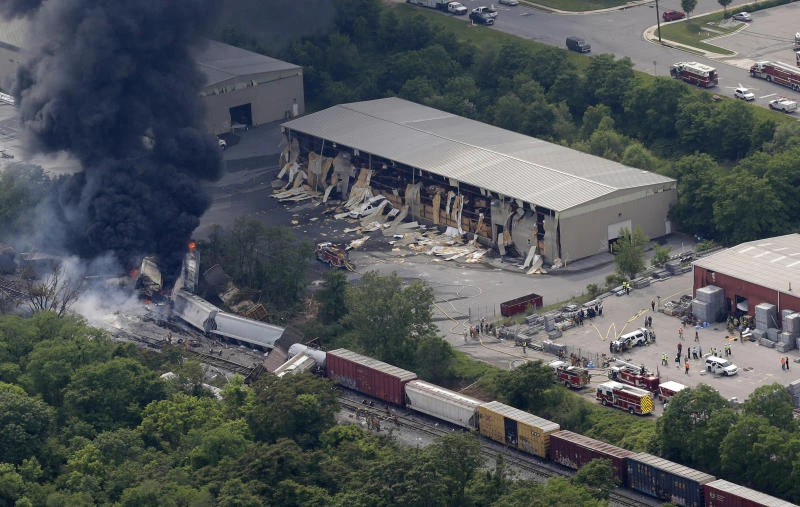 US probes train derailment, blast