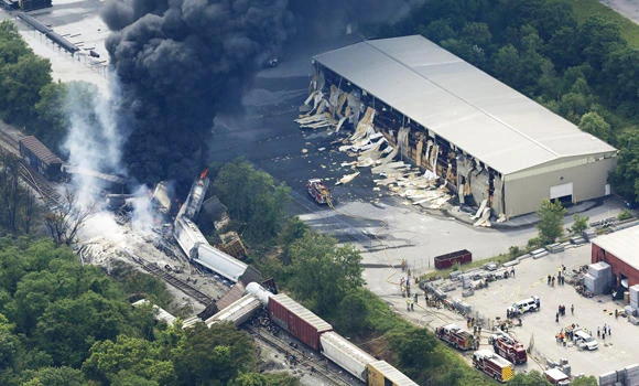 US train derailment, blast crumple buildings