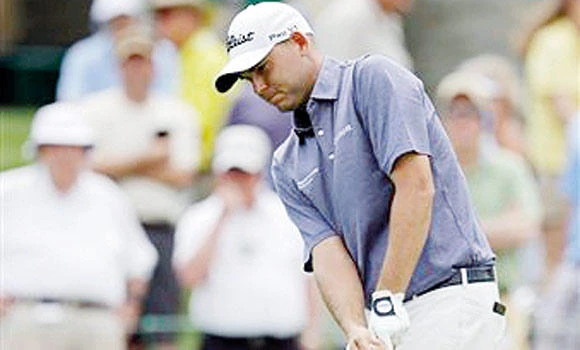 Haas clings to lead over Schwartzel at Memorial