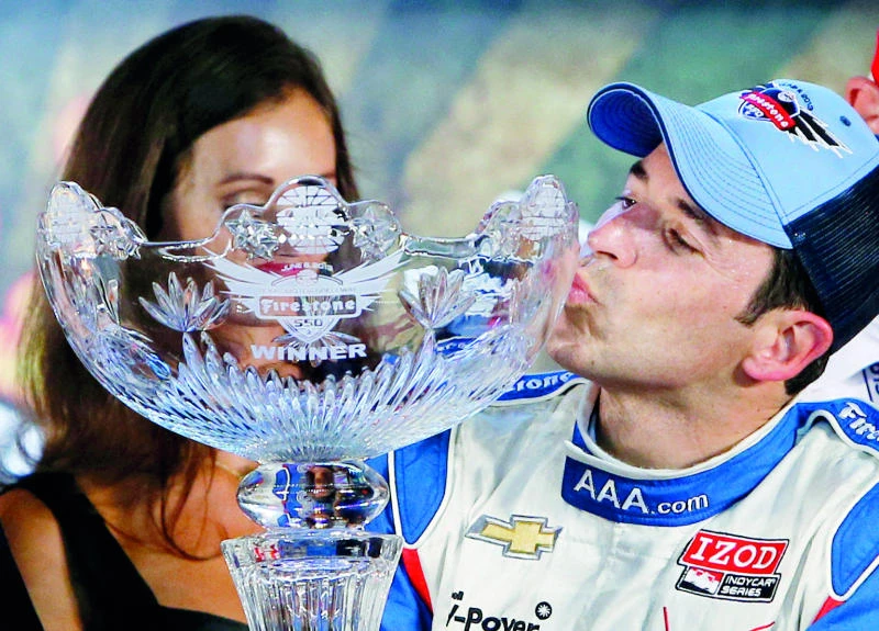 Castroneves wins at Texas, grabs points lead