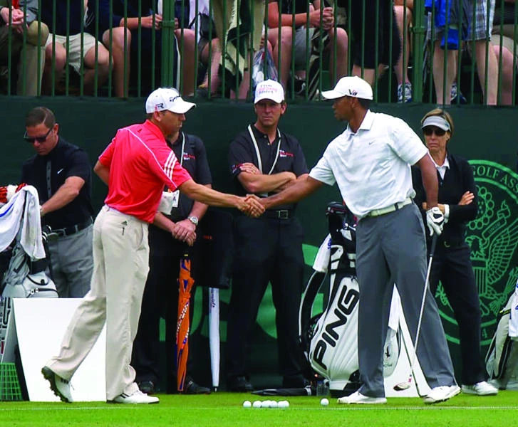 Garcia, Woods shake hands