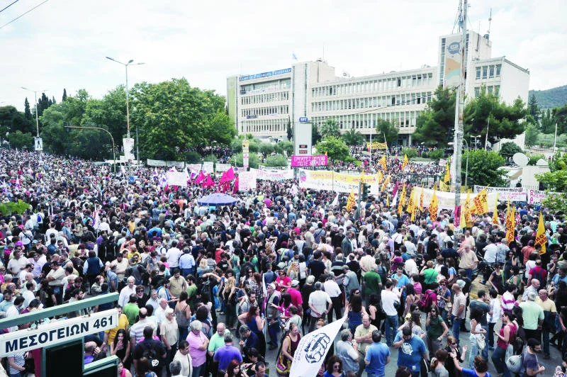 Greeks strike as fury over state TV shutdown grows
