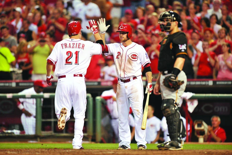 Four solo homers key Reds victory over Pirates