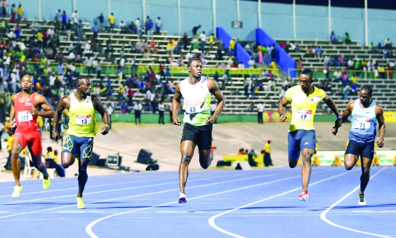 Bolt wins Jamaican 100 title, qualifies for worlds