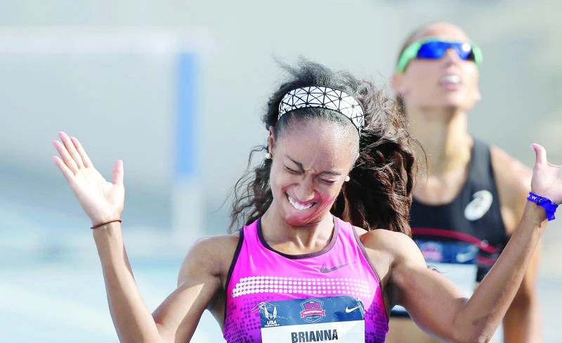 Rollins storms into worlds in 100 hurdles