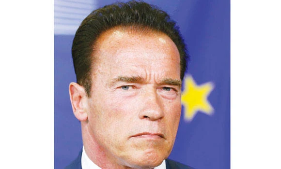Arnie defends his Hummer fleet as eco-friendly