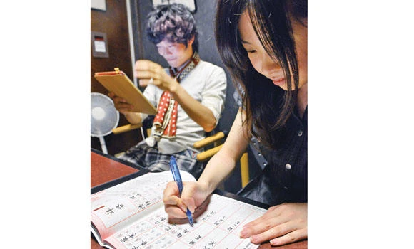 In Asia, ancient writing collides with the digital age