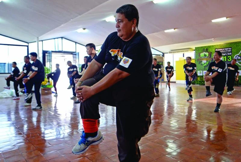 Thailand’s traffic cops battle obesity