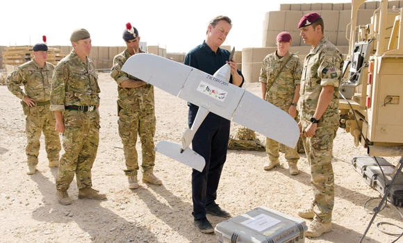 Cameron in Afghanistan to push for peace talks