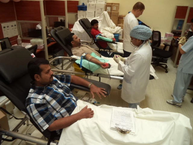 Expats donate blood for pilgrims