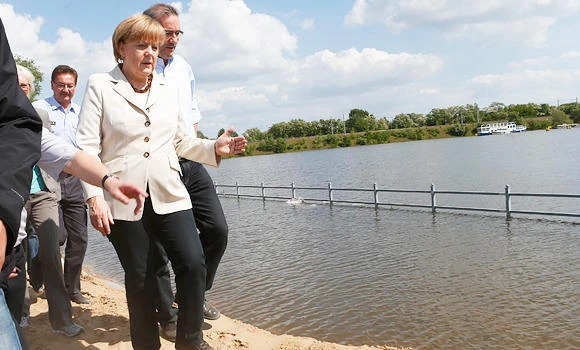Merkel visits flooded region as Hungary waters recede