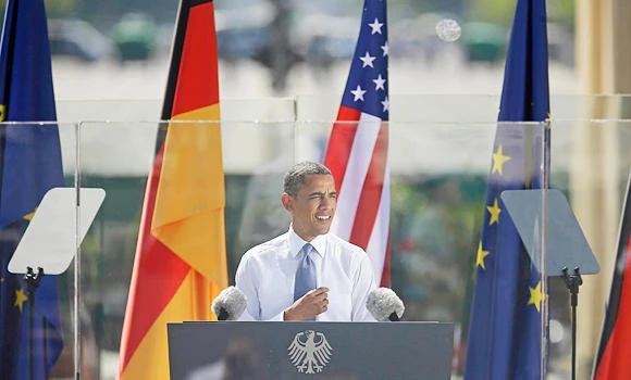 Obama defends spying program in German visit