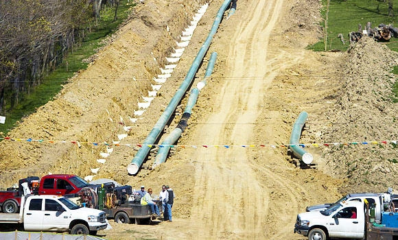IEA trims forecasts for global oil demand