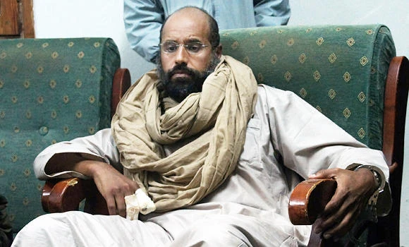 Lawyer for Qaddafi son wants him handed to ICC