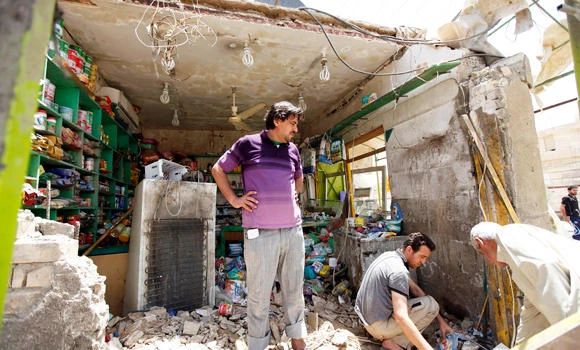 Bombs strike Iraqi markets killing 21