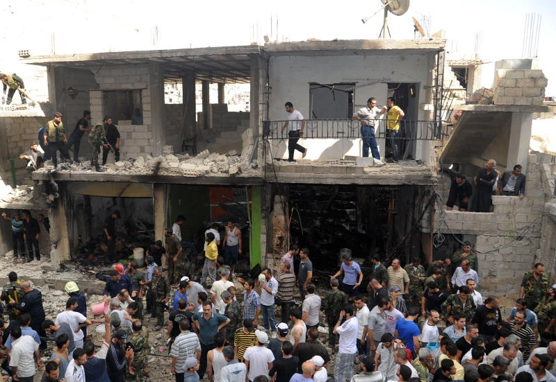 Bombs hit Damascus, Aleppo
