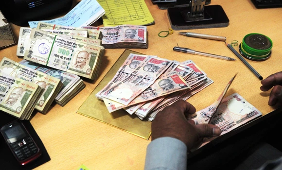 India's rupee hits new record low of 60 to the dollar