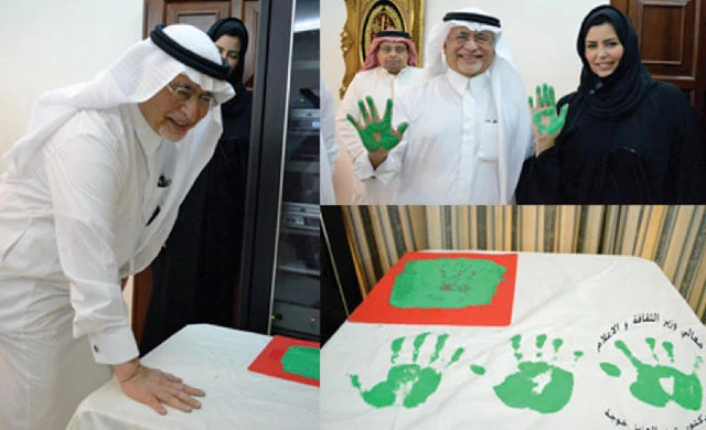 Minister Khoja imprints hand on record painting