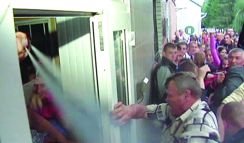 Ukraine police unit stormed after brutal rape
