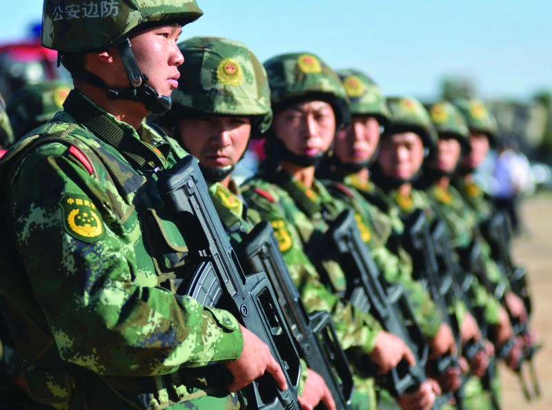 Xinjiang security tight on riot anniversary