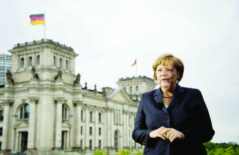 Merkel pushes for tough line on Internet firms