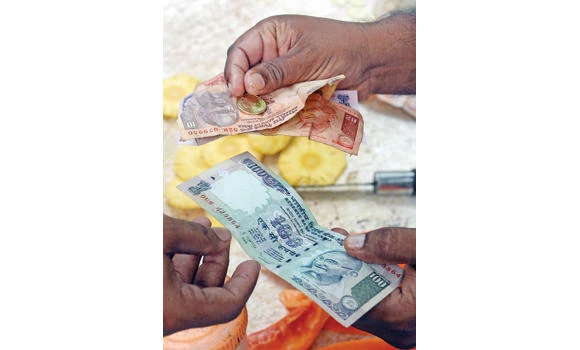 India’s rupee rebounds after RBI hikes rates