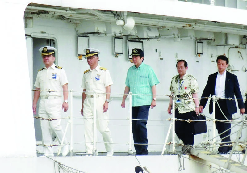 Japan’s Abe renews claim to disputed islands in China Sea