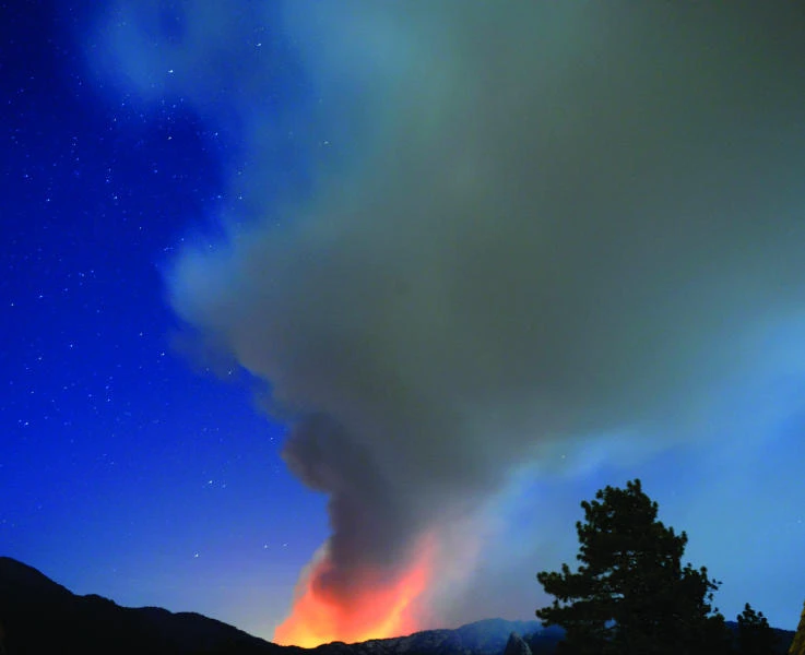 California wildfire growing as mountain town evacuates