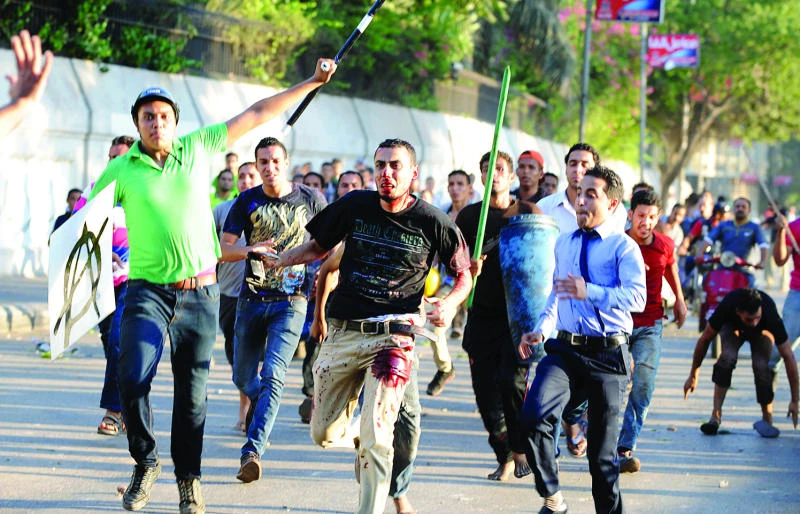 Chaotic Egypt bleeds: Clashes kill scores