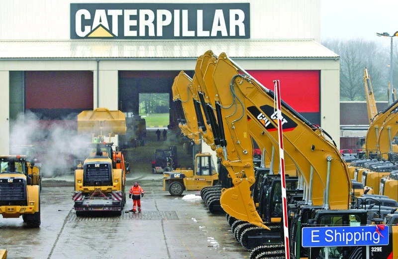 Caterpillar Q2 profit falls 43%; cuts outlook
