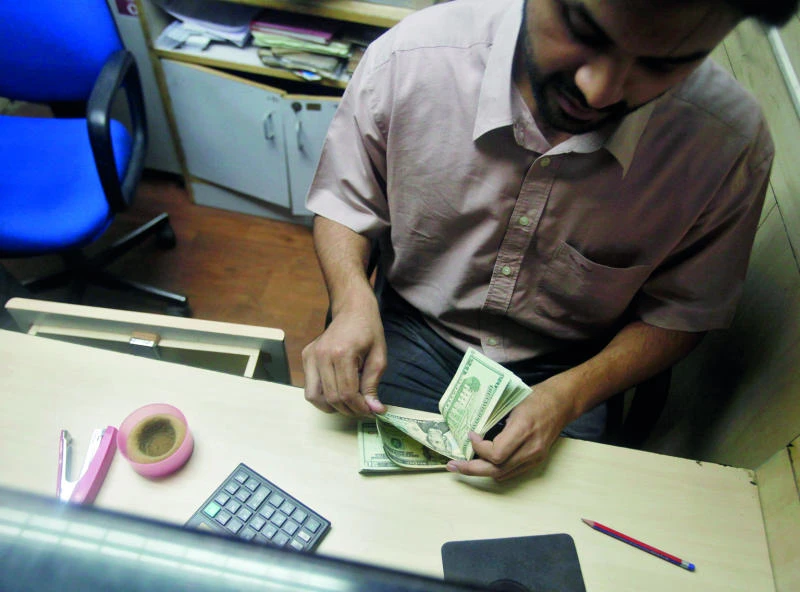 India’s rupee posts biggest gain in a month