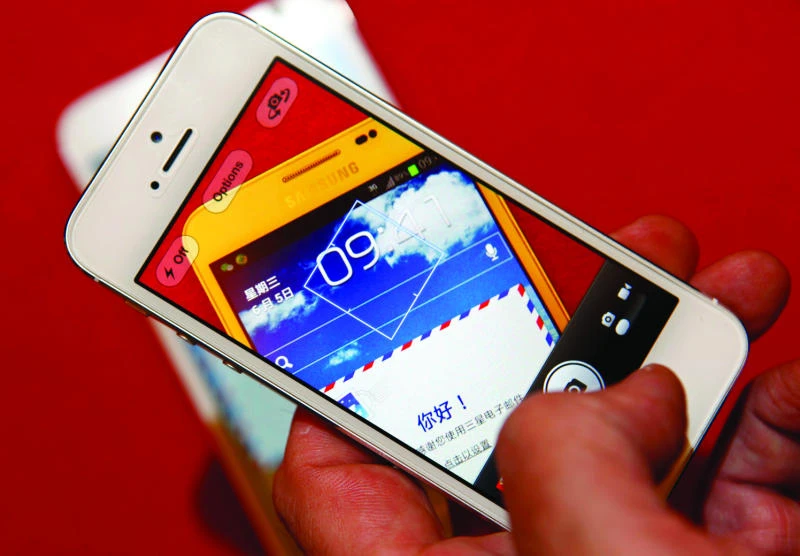 Apple is squeezed as smartphone market expands