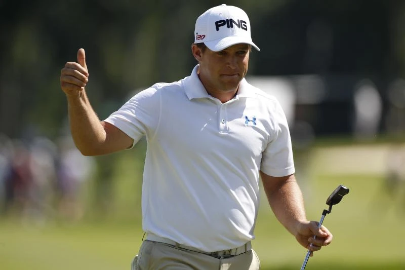 Summerhays hot, seizes lead with 62